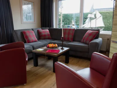 Schippershuisje Ferienhaus am meer in Cadzand-Bad Zeeland Wohnzimmer