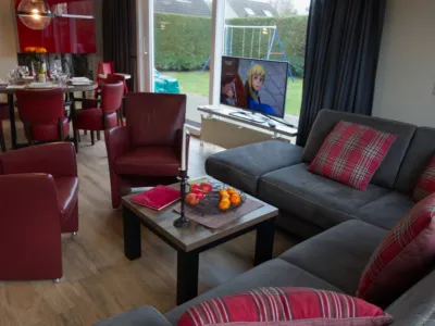 Schippershuisje Ferienhaus am meer in Cadzand-Bad Zeeland Wohnzimmer